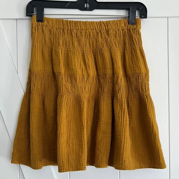 Madewell Double Gauze Smocked Mini Skirt in Mustard. - Picture 1 of 5